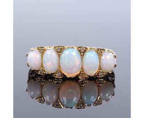 An 18ct gold 5-stone graduated opal and diamond half-hoop ring, with carved scrollwork bridge, maker's marks FRS Ltd, hallmar