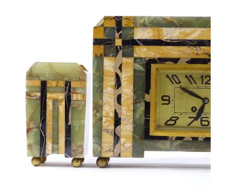 An Art Deco multi-colour marble and onyx-cased clock garniture, clock height 26cm 