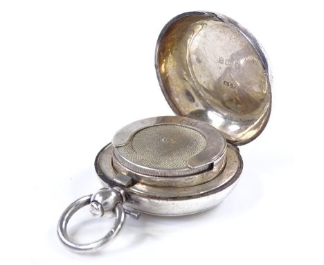 An Edwardian circular silver sovereign case, with engine turned decoration, by Dennison Watch Case Co, hallmarks Birmingham 1