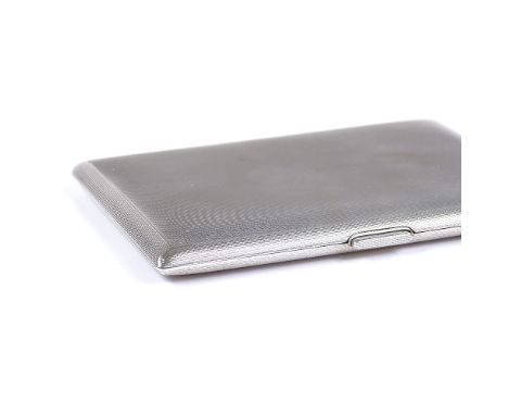 A rectangular silver cigarette case, with gilded interior and engine turned decoration, by Garrard &amp; Co Ltd, hallmarks Bi