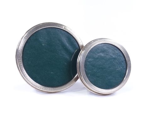 2 circular silver graduated photo frames with engine turned surrounds, by Sanders &amp; Mackenzie, hallmarks Birmingham 1977,
