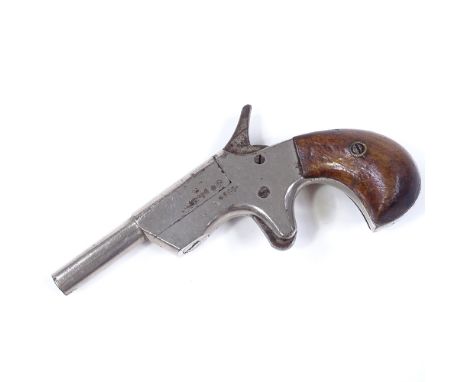 A small Antique Pinfire pocket pistol, length 12cm 