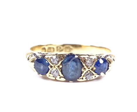 An 18ct gold 7-stone sapphire and diamond half-hoop ring, hallmarks Chester 1907, setting height 6mm, size M, 3.4g 