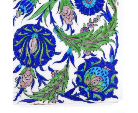 A Turkish ceramic tile with painted decoration, height 24cm (A/F) 