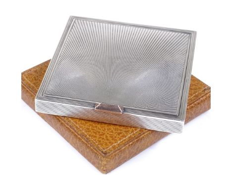 An Art Deco style square sterling silver compact, with 14ct gold push button and engine turned sunburst decoration, by David 