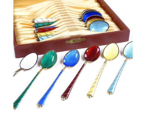A set of 12 Danish sterling silver-gilt and coloured enamel coffee spoons, with engine turned bowls and handles, maker's mark