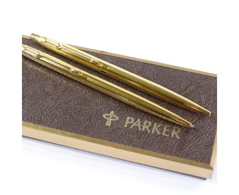 A Parker gold plated ballpoint pen and propelling pencil set, new and unused condition, boxed 