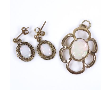 A 9ct gold opal openwork pendant, length 30mm, 3g, together with a pair of 9ct opal drop earrings, height excluding fitting 1