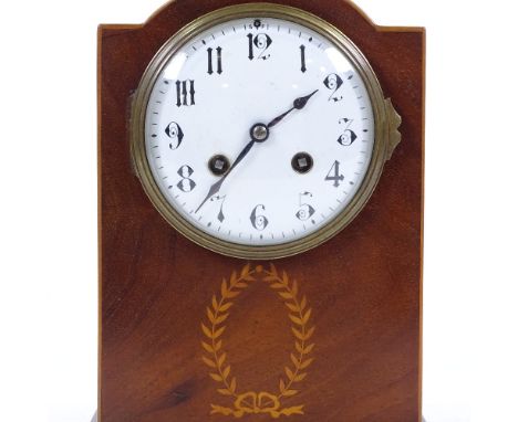 An Edwardian mahogany-cased mantel clock, with enamel dial, and 8-day striking movement, height excluding handle 25cm 