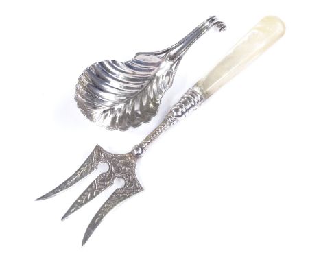 An unmarked Georgian silver tea leaf caddy spoon, length 8cm, together with a silver and mother-of-pearl handled pickle fork,