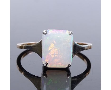 A 9ct gold cabochon opal dress ring, setting height 10mm, size S, 1.9g 