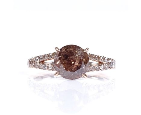 A 14ct rose gold 1.51ct solitaire fancy orangy brown diamond ring, with diamond set shoulders, total diamond content approx 1