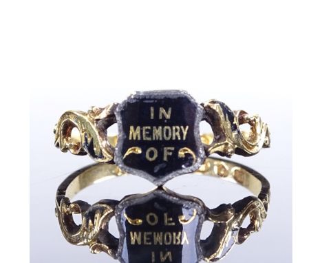 A Victorian 18ct gold black enamel mourning ring, with "In memory of" plaque, pierced foliate shoulders and engraved shank, h