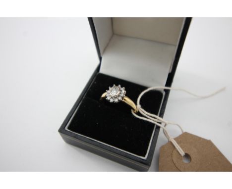 Diamond (approx. .5ct. gold) cluster ring (size M)