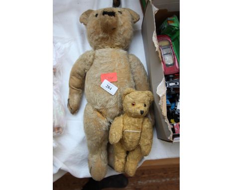 Pair of vintage teddy bears with moveable limbs