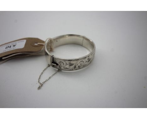 Silver decorated bangle (marked London 1965)