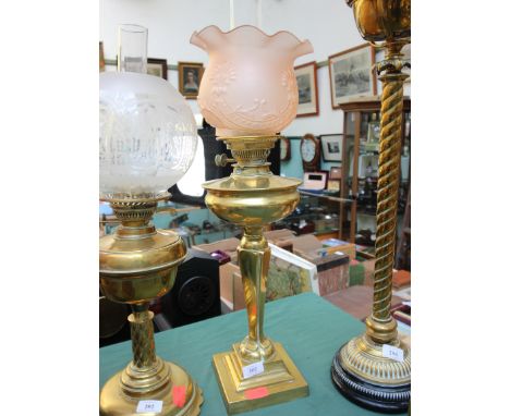 Attractive brass oil lamp, Art Nouveau style with peach shade and funnel