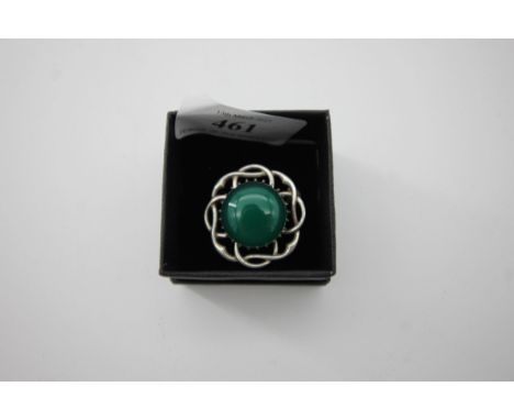 Coloured stone, silver surround brooch