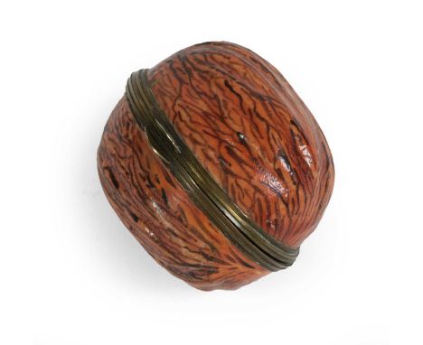 A South Staffordshire Enamel Bonbonniere, circa 1770, moulded and decorated as a walnut, 5cm longProvenance:The collection of
