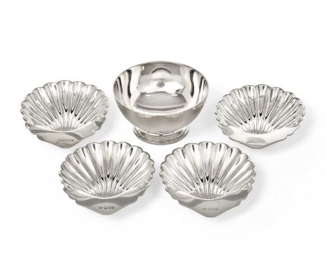A Set of Four Elizabeth II Silver Dishes, by Suckling Ltd., Birmingham, 1961, each shell-shaped and on three ball feet, 10cm 