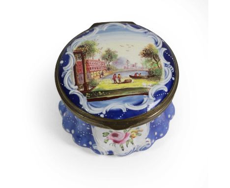 A South Staffordshire Enamel Patch Box, circa 1765, of circular form, painted with a lake before a country house and with flo
