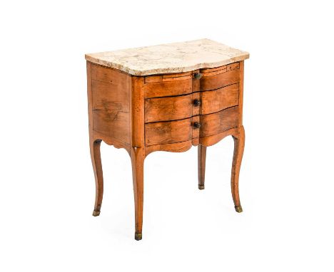 A 20th Century Walnut Petit Commode, in Louis XV style, the modern cream veined serpentine marble top above a pull-out brushi