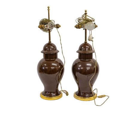 A Pair of Turned Wood Lamp Bases, 20th century, 34cm high, fitted for electricity; A Similar Pair of Brass Lamp Bases, 29cm h