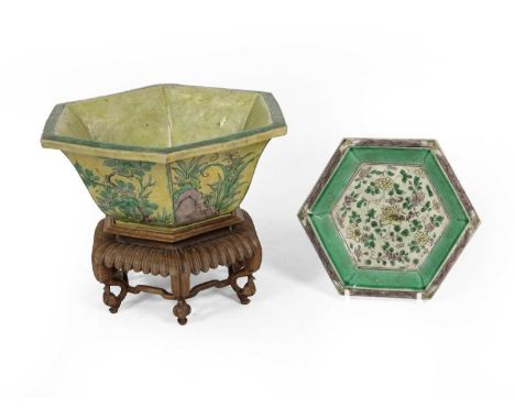 A Chinese Yellow Ground Porcelain Hexagonal Bowl, Kangxi, painted in famille verte enamels with panels of fruit, foliage and 