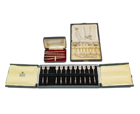 A Cased Set of Eleven Elizabeth II Silver and Enamel Cocktail-Sticks, by Garrard, Birmingham, 1961, the terminal of each enam