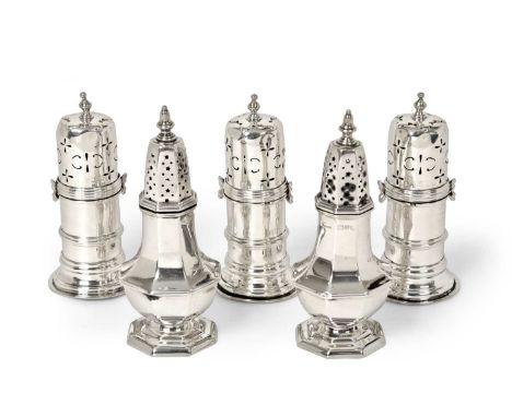 A Set of Three Edward VII Silver Pepperettes, by S. J. Phillips, London, 1901, each of lighthouse-form and on spreading base,