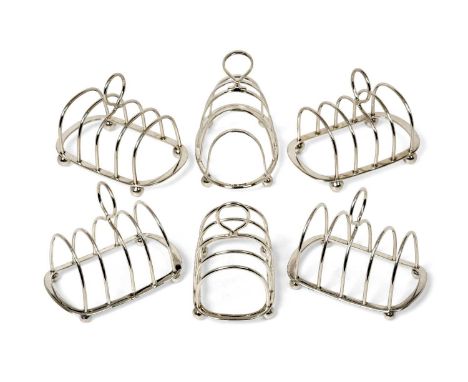 A Pair of Victorian/Edward VII Silver Toastracks and a Pair of George V Silver Toastracks, The First Pair by Heath and Middle