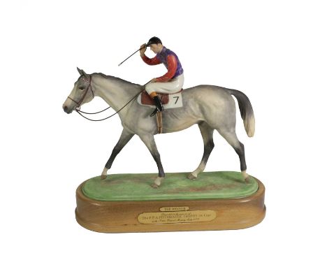 A Royal Worcester Porcelain Group of The Winner, circa 1970, modelled by Doris Lindner, as a grey racehorse with jockey up we