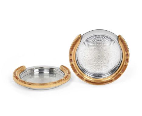 A Pair of Parcel-Gilt Plated Ashtrays, Retailed by Hermès, Paris, 20th Century, each modelled as a horseshoe and with engine-