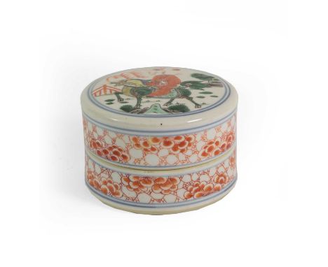 A Chinese Porcelain Circular Box and Cover, Kangxi, painted in famille verte enamels with an immortal riding a kylin in lands