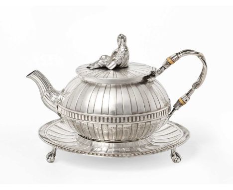 A George III Silver Teapot and Stand, Maker's Mark SW, London, 1774, the teapot with fluted sides and a central band, with op