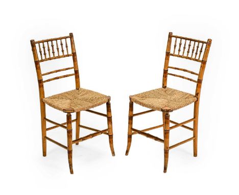 A Pair of Regency Simulated-Bamboo, Ebonised and Rush-Seated Dining Chairs, early 19th century, later decorated, 35cm by 34cm