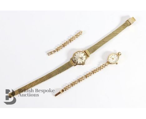 9ct gold lady's Baume wrist watch, the watch having a champagne face with baton markers, on a rolled gold strap, weight of wa