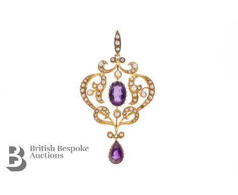Antique 15ct yellow gold amethyst and seed pearl pendant. The pendant set with a amethyst 10 x 8 mm and a pear-shaped drop 10