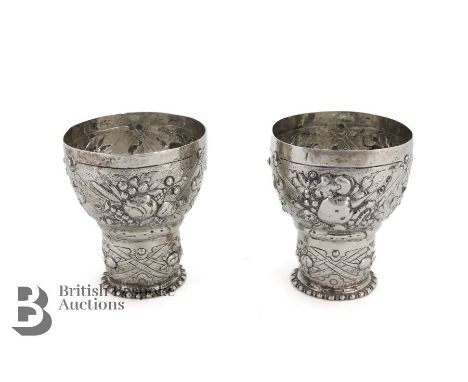 Pair of Continental silver 17th century ecclesiastical wine cups (roemer), city mark Augsburg, rubbed makers marks to rim. Ea