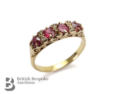 Antique 18ct yellow gold ruby and diamond ring. The ring set with four rubies approx 3.6mm interspersed with five rosecut dia