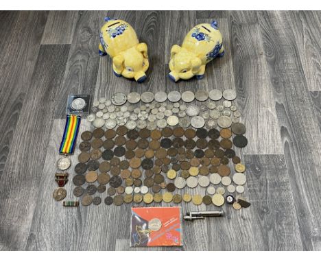 Collection of Coins to include Silver Coins along with Two Medals and Pair of Vintage Ceramic Piggy Banks. 