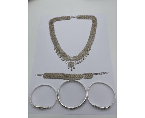 Vintage 925 Hallmarked Silver Necklace and Bracelet along with Three 925 Hallmarked Silver Bangles. 