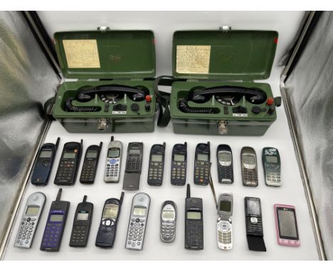 Two GPO 704A Field Telephones along with a collection of vintage mobile phones. 