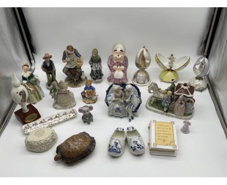 Assortment of Porcelain and Ceramic items to include Music Box Eggs, Delft, Hummel and others. 