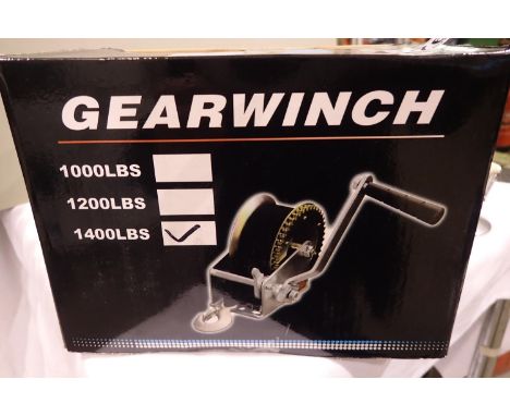 New and boxed 1400lb manual gear winch. P&amp;P Group 1 (£14+VAT for the first lot and £1+VAT for subsequent lots) 