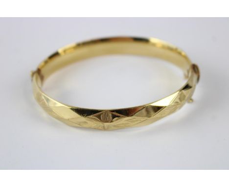 Vintage rolled gold bangle w/ floral engraving 