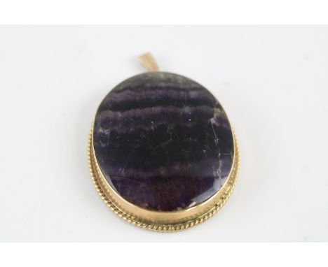 Vintage 1973 9ct gold framed large oval blue john Pendant, Approximate measurements: 40mm by 34mm, Overall good condition, ag