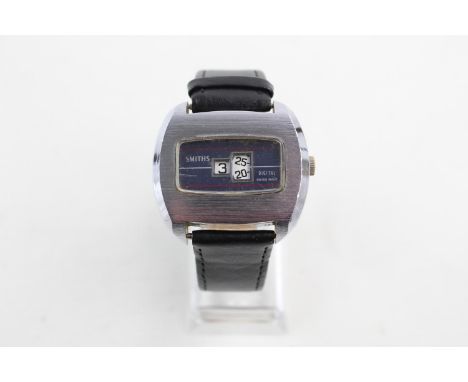 Vintage Gents Smiths digital jump hours wristwatch Hand-Wind w/ blue rectangular dial TV style case, black watch strap  face 