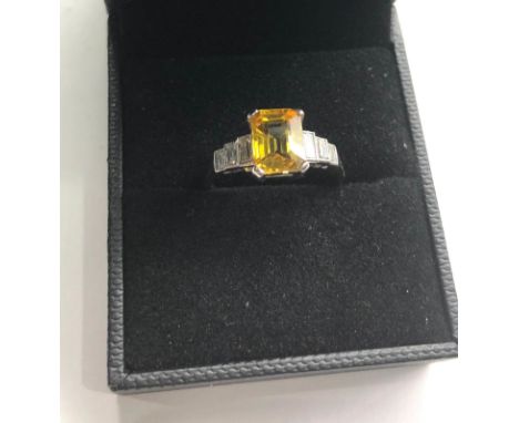 18ct white gold diamond and yellow sapphire ring large central yellow sapphire that measures approx 8.5mm by 7mm with 3 bague