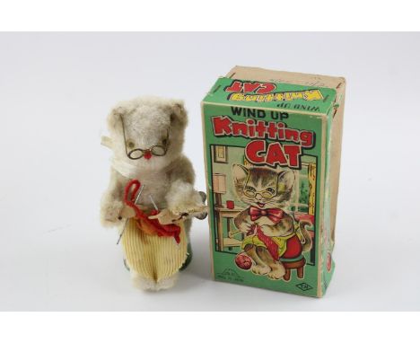 Vintage knitting cat wind up toy  w/ Original key &amp; box  working In vintage condition  Signs of use &amp; age  Please see